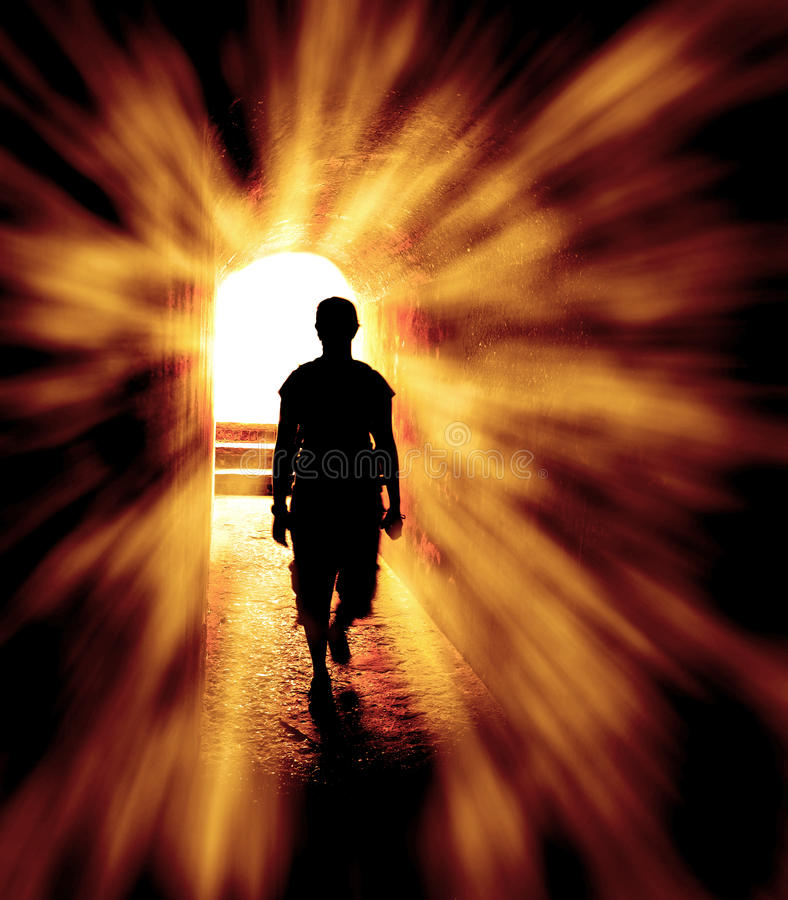 hope-end-tunnel-person-long-walking-towards-light-rays-39872266